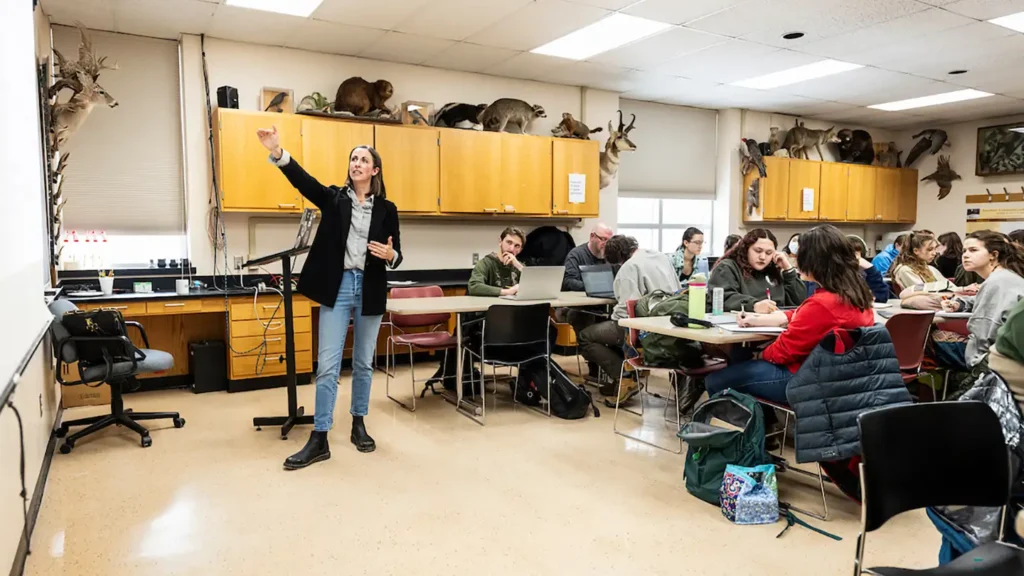 Amy Trowbridge and students in a classroom during an ecology class.